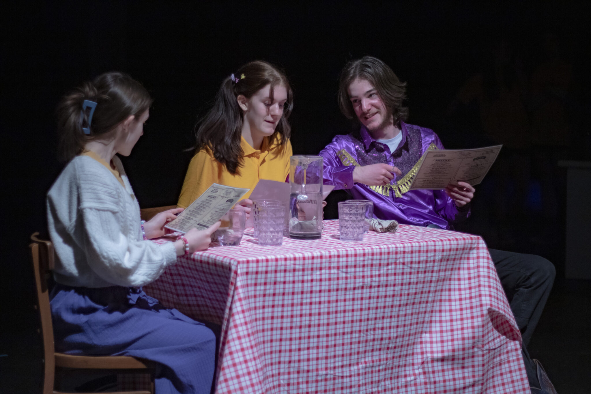 Kenny Batts attempting to impress Ms. Dunning and trying not to embarrass his daughter, Rowena. He's trying not to order a "plate of dead cow." (Zoe Smith, Jasmine White, Me)